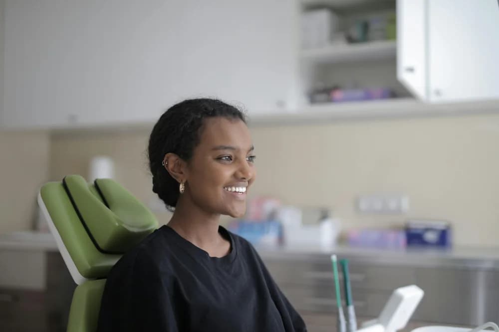 Patient smiling during orthodontic consultation